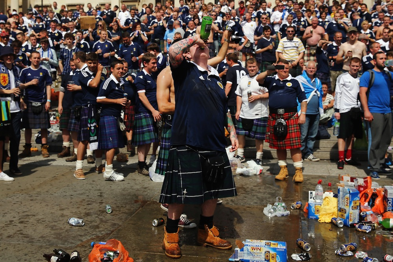 Illustration for article titled A Photo Tribute To Drunk Scottish Fans